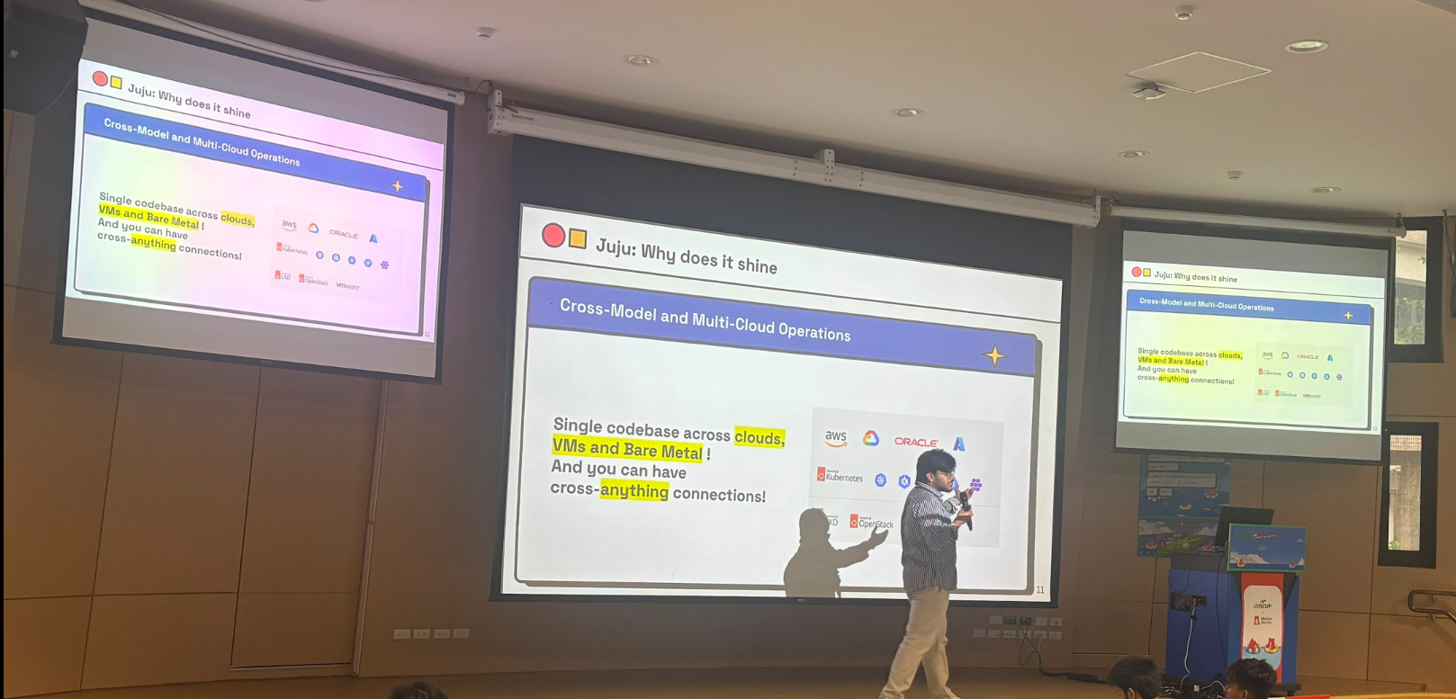 On stage at NTUST, opening the talk with why Juju exists